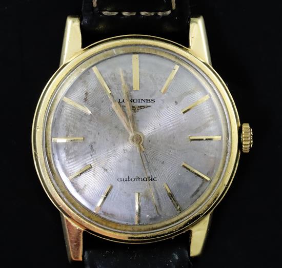 A gentlemans early 1960s 18ct gold Longines automatic wrist watch,